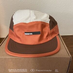 NWT Ciele ALZ running cap in brown/ivory/burnt orange.